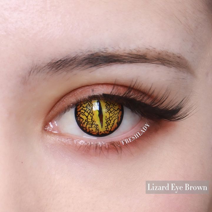Lente de Halloween #24: Ámbar dorado agrietado con pupila rasgada de reptil · foto 5